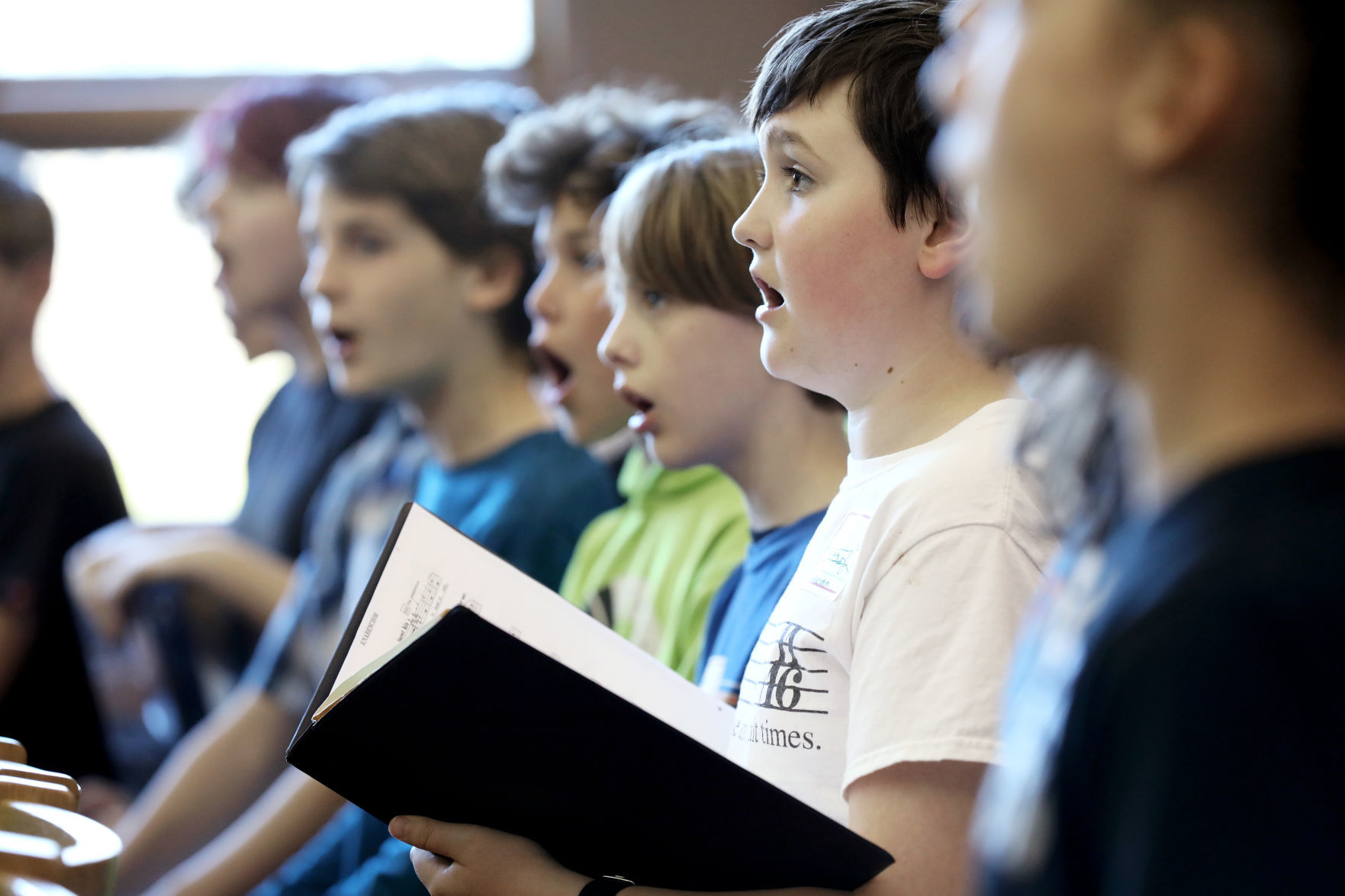 Boys singing in rehearsal